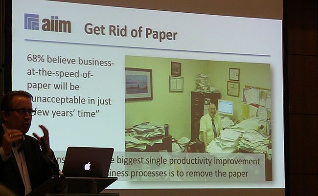 Paper slows down digital transformation - business at the speed of paper is unacceptable - also in manufacturing where it still is a MES software market driver - picture J-P De Clerck