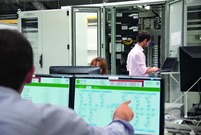 PACiS (front) is a Digital Control System for Substation Automation from Schneider Electric